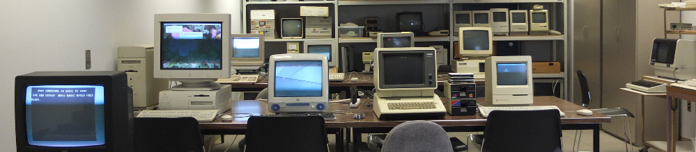 a room with old computers on tables